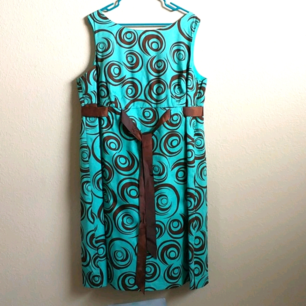 Elizabeth Howard  turquoise and brown dress